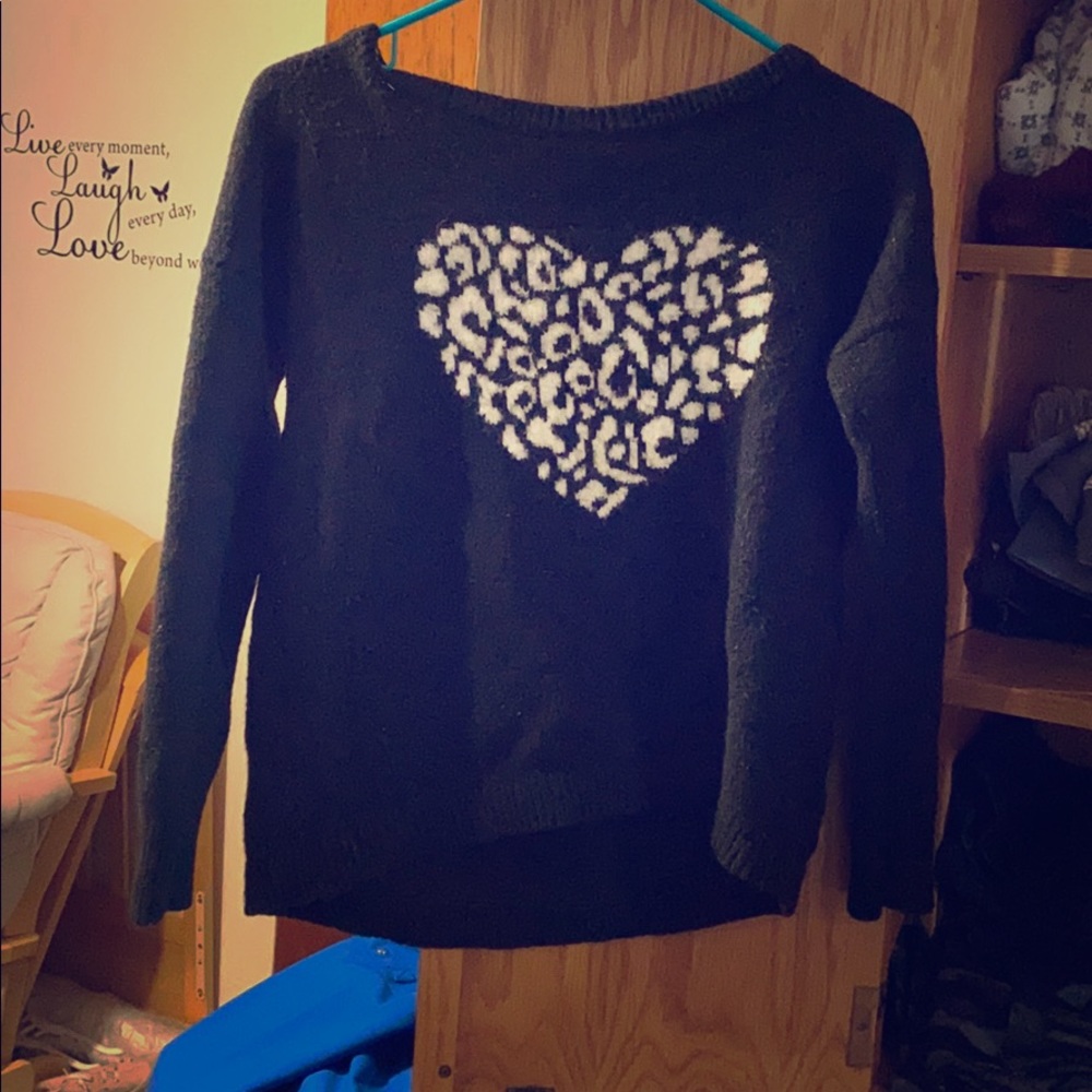 Black sweater with heart design